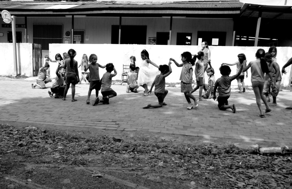 Photo of Children Playing in a Schoolyard.